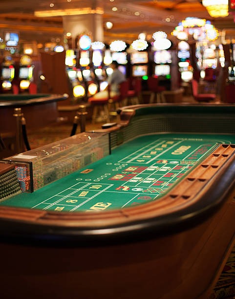Professional dealer rolling in live studio Live dealer rolling dice in professional studio